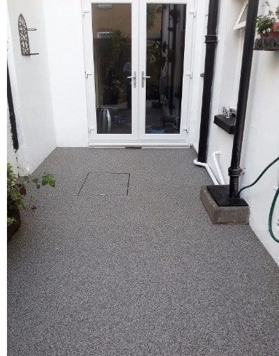 After - GREY RESIN COURTYARD
